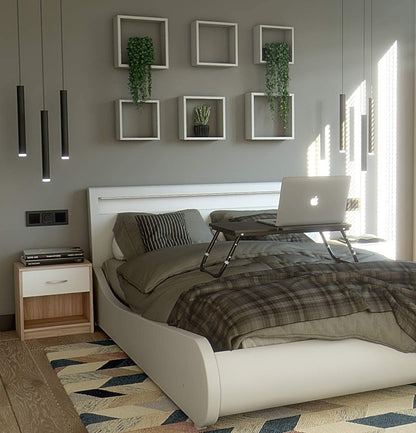 Modern Home bedside table with a white drawer and aluminum handle next to a bed in a contemporary bedroom.