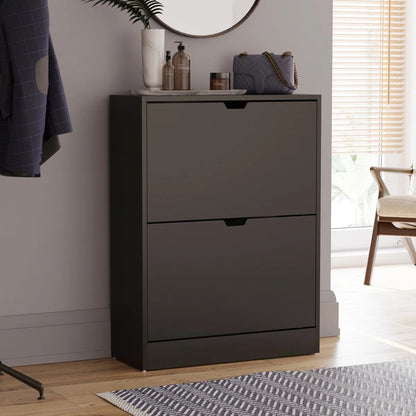 Modern Home matte black two-tier shoe storage cabinet with pull-down drawers in a minimalist entryway setting.