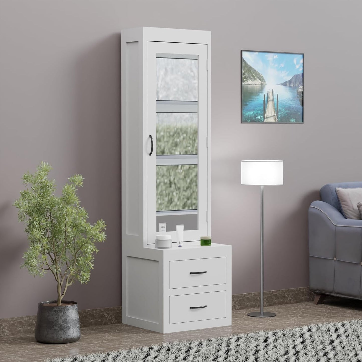 Modern Home tall white storage cabinet with a mirrored door and two drawers, featuring sleek metal handles in a room.