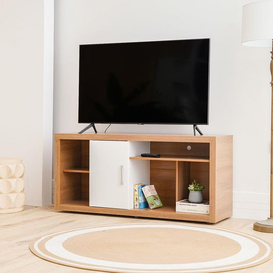 Modern Home two-tone media console with natural wood grain and white cabinet door, featuring open shelving and TV stand.