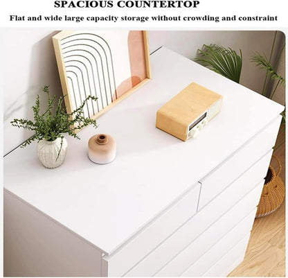 Modern Home white 5-drawer dresser with a spacious flat countertop styled with a framed print, vase, and wooden radio.