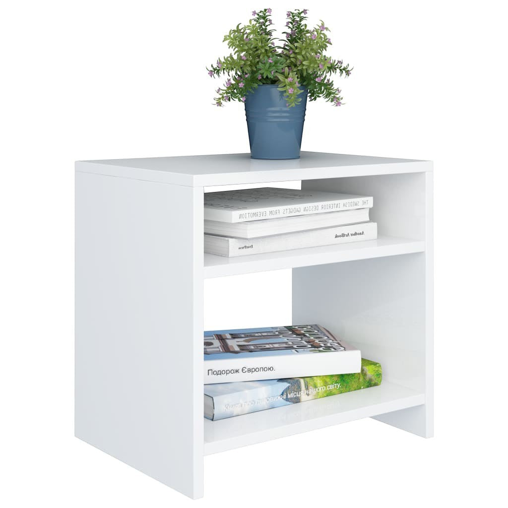 Modern Home white bedside table with two open shelves, styled with books and a small potted plant.