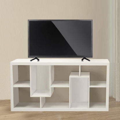 Modern Home white geometric storage bookcase and media console with asymmetrical shelving holding a flat screen TV.
