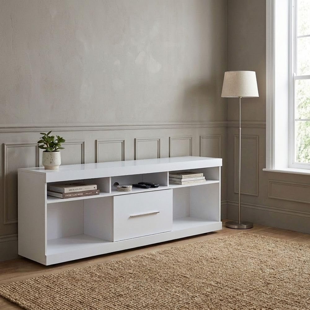 Modern Home white media console TV stand with open shelving and a central storage drawer on a jute rug.